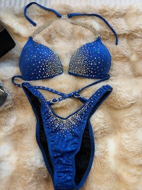 Muscle Dazzle Royal Blue Figure Suit never worn original box included